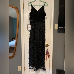 Formal dress with floral appliqué